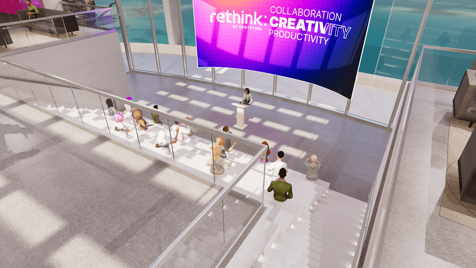 A reTHINK keynote stage with a branded screen and a seated audience